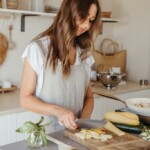 woman chopping in the kitchen_manage blood sugar